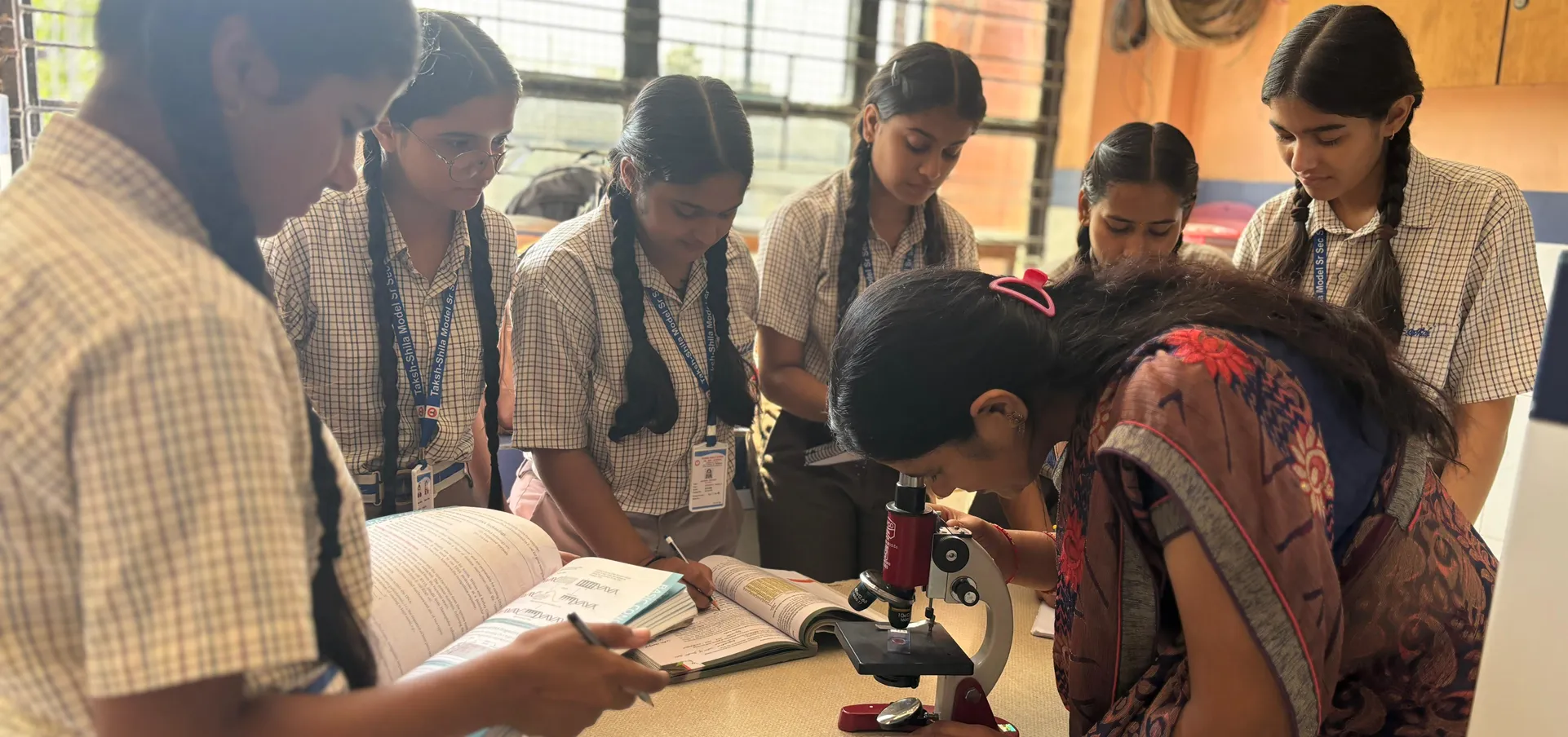 Parents touring school campus with admissions coordinator